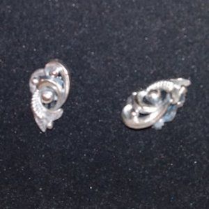 Botticelli: Silver tone Clip earrings